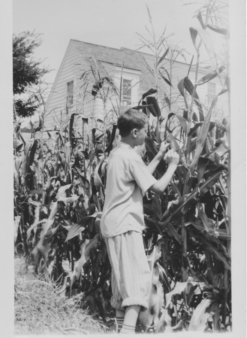 Jim Crawmer in back yard at 3917 Paunack Avenue, ca. 1942