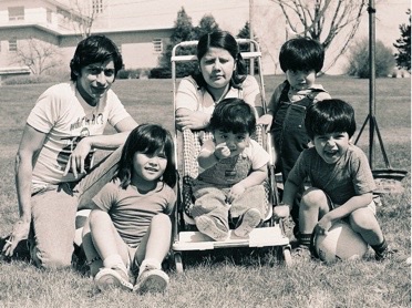 Photo of "Gonzalez" family on the grounds of St. Benedict's Monastery where they were in Sanctuary, 1984