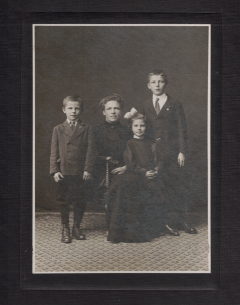 Photo of Rachel Rocca with her three children, John, Rose, and James