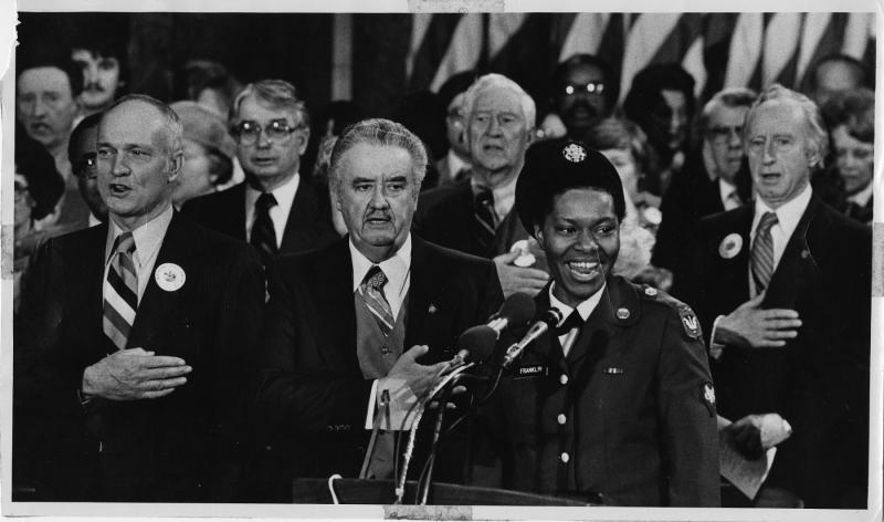 Photograph of Linda Franklin singing at Lee Dreyfus inaugural.