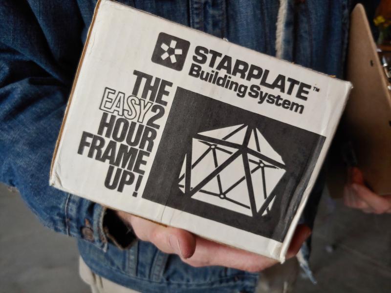 Person holding Starplate™ box