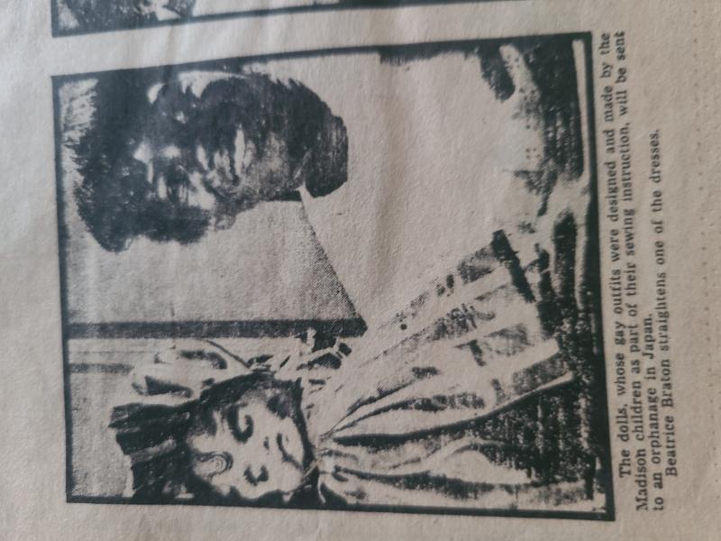 Newspaper clipping featuring Beatrice Chatman and handmade doll