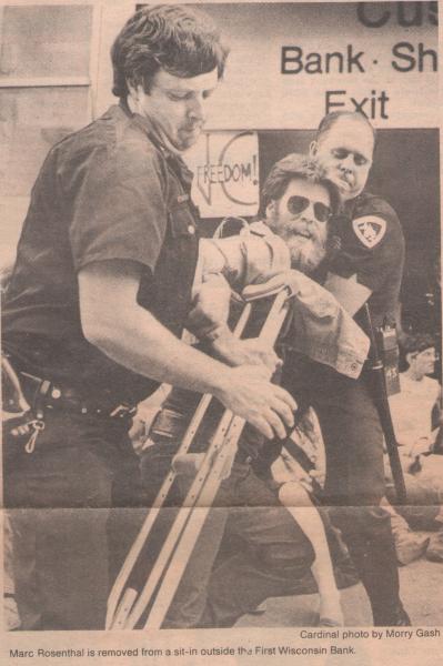 Photo of Marc Rosenthal being arrested in an anti-apartheid demonstration at Madison's Capitol Square, 1983 