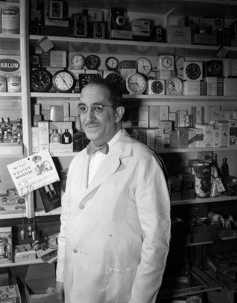 Sam Schwartz at his pharmacy, 902 Mound St, Madison, 1952