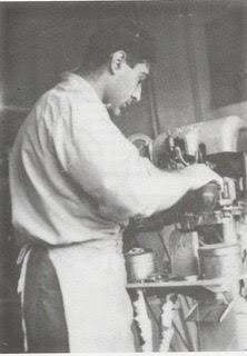 Abe Barash working at his shoe repair shop, Madison, 1944